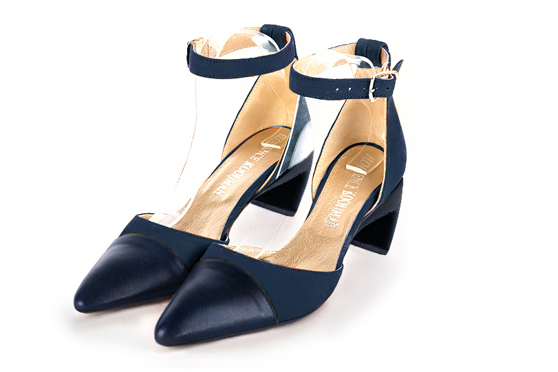Navy blue women's open side shoes, with a strap around the ankle. Tapered toe. Medium comma heels. Front view - Florence KOOIJMAN